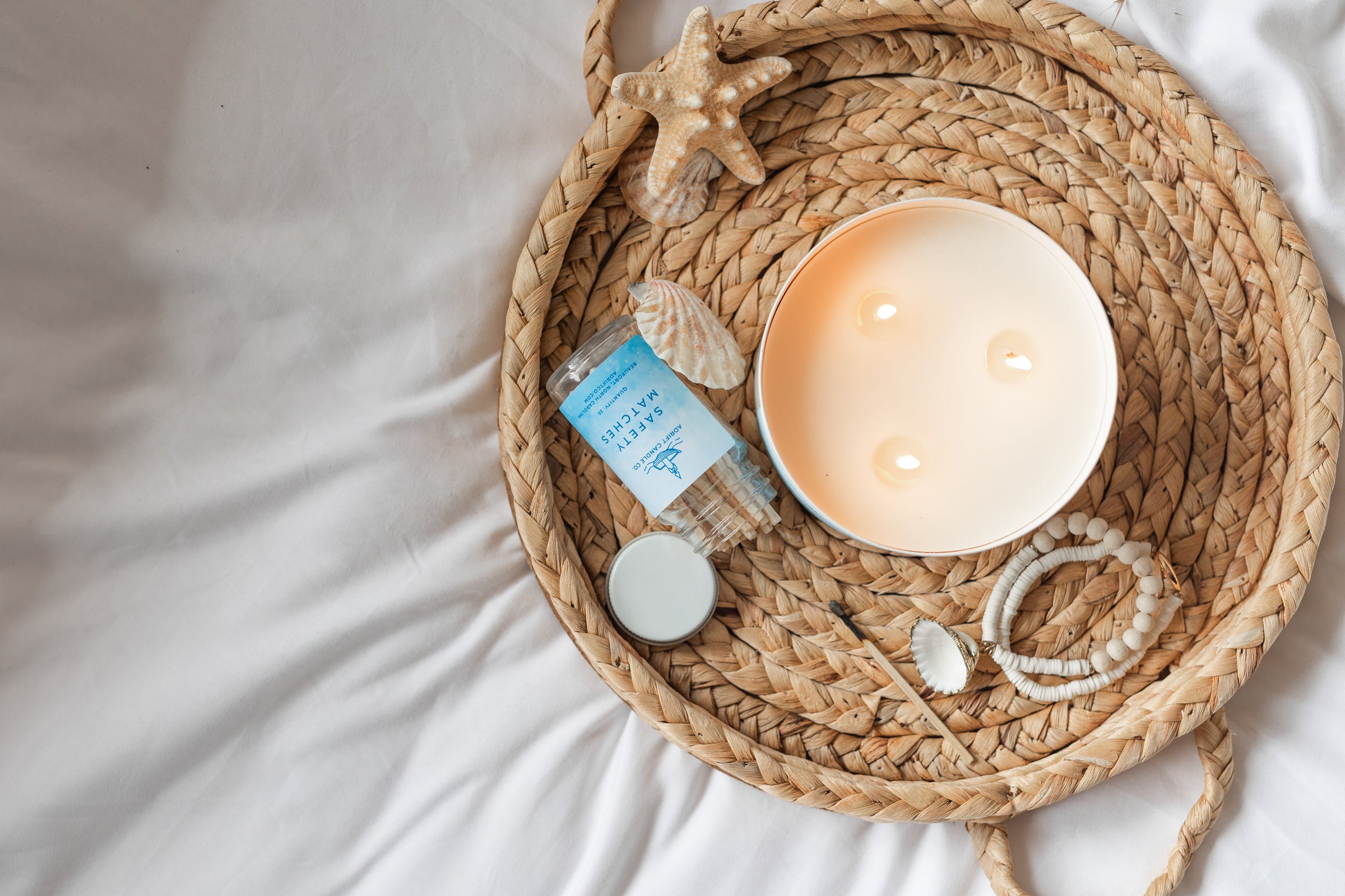 mahogany teakwood candle by Adrift Candle Co.