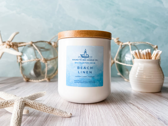 coastal themed candle in matte white jar