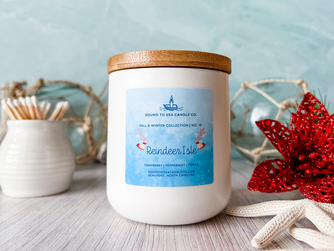 reindeer isle candle in matte white jar